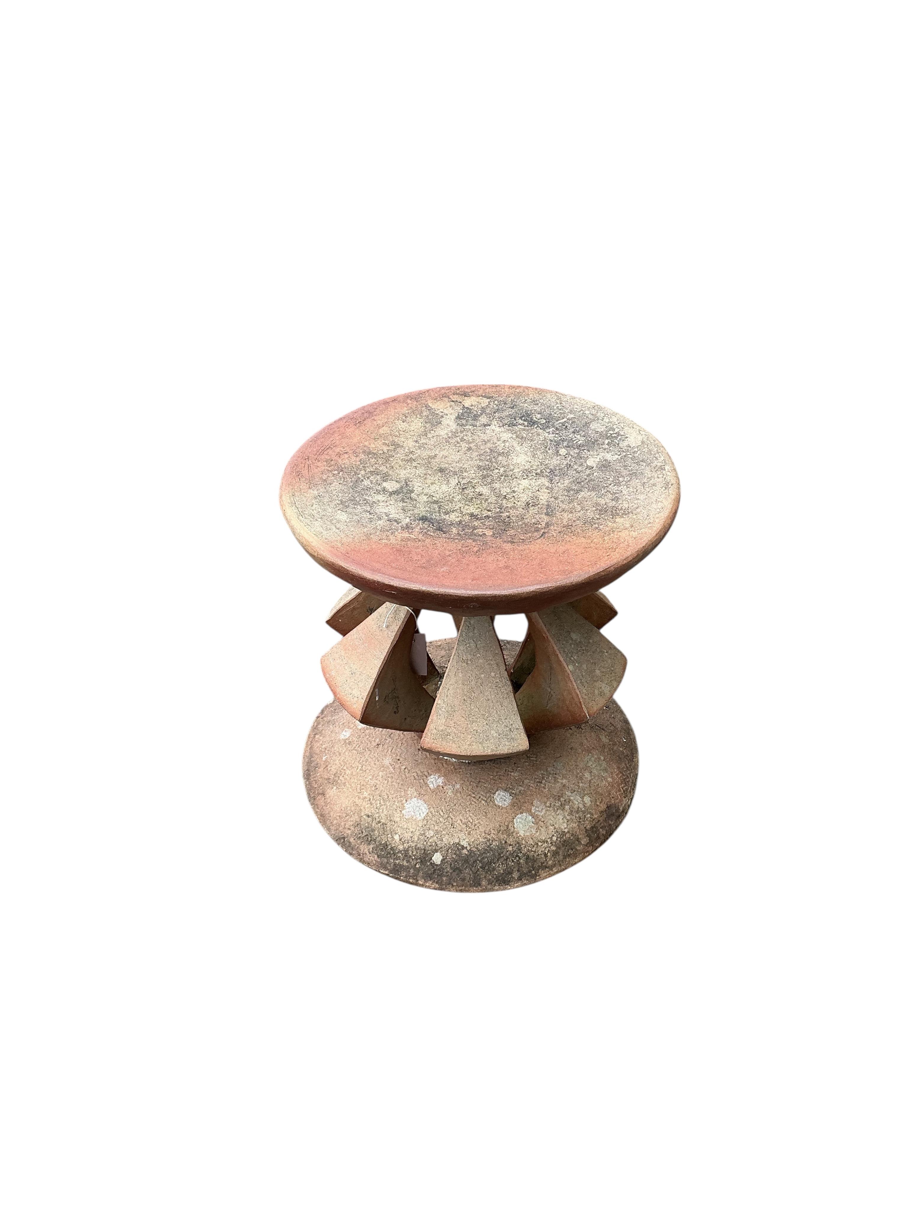 An earthenware garden sculpture or stand, height 46cm